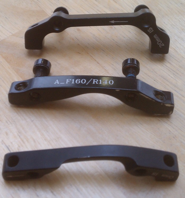 The top bracket is for 180mm and says 20mm on it, the middle and bottom ones are for 160/140mm and say 0mm on them.