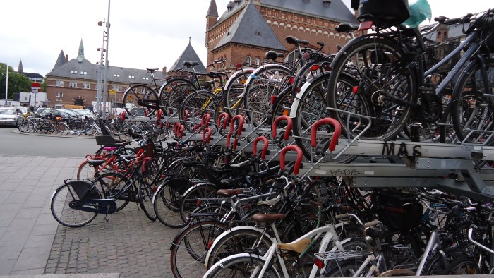 These ingenious double-decker bike racks double the amount of bikes you can store in a given space.