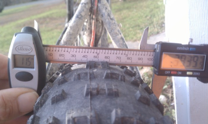 3.9 inches on a 80mm rim at 11.5psi, read it and weap Vee Rubber.