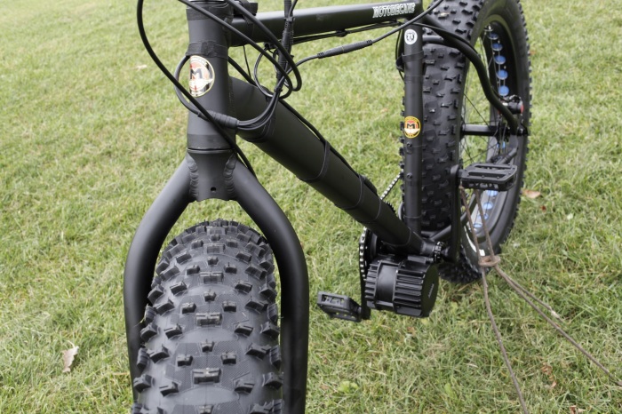 You can see in this image the lack of clearance on the front fork.