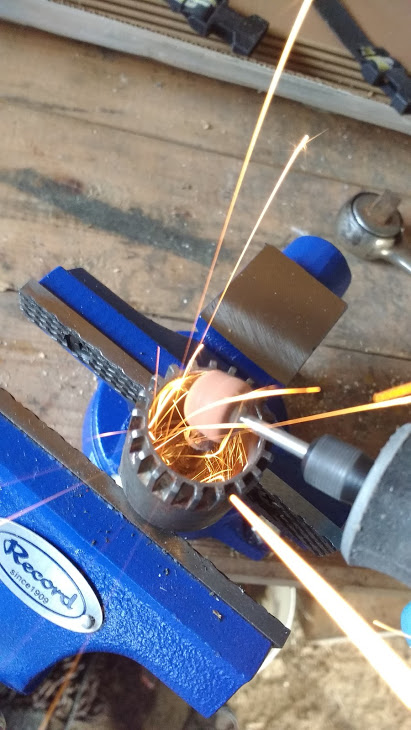 Step 3 : My Bearing removal tool had a pin that would hit the axle so I ended up having to grind it down so the tool would seat properly