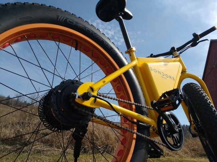 The existing motor is left alone, only the controller and battery are upgraded and a second motor added